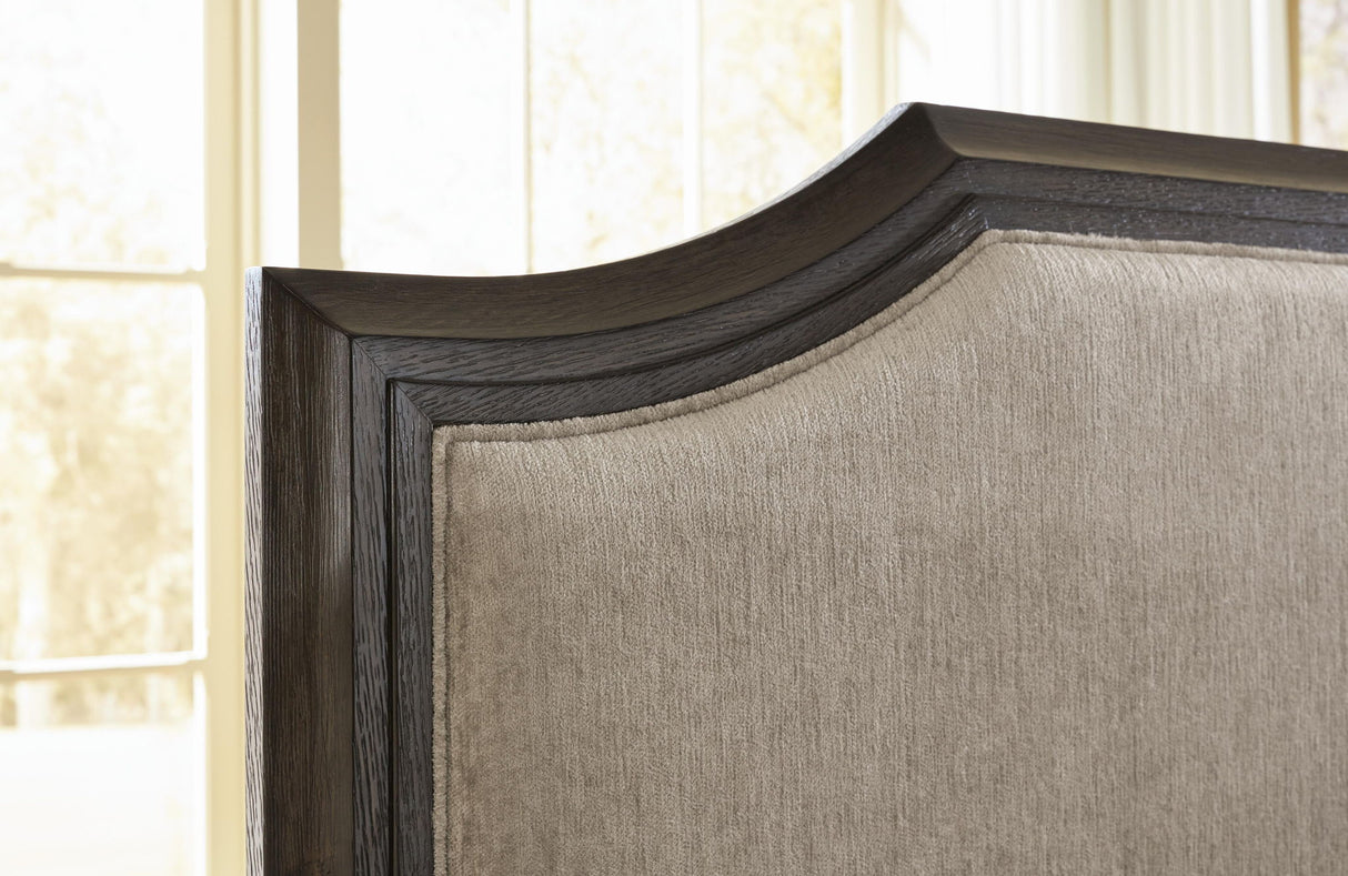 Wickenger - King Upholstered Panel Bed - Dark Brown