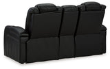 Caveman Den - Midnight - Power Reclining Loveseat With Console/ Adj Hdrst